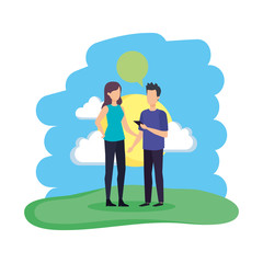 young couple with speech bubble in the field
