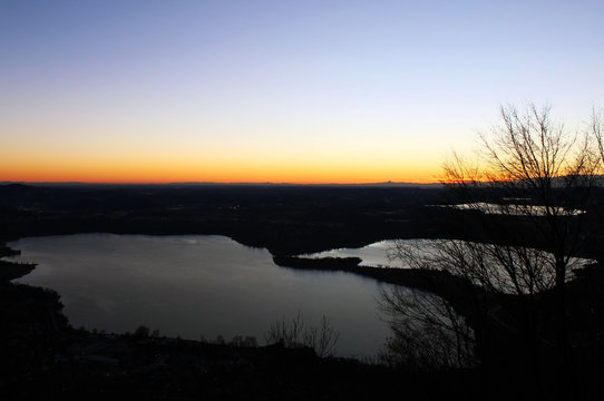 Annone lake at sunset from monte Barro (northern Lombardy) during a clear sky autumn night