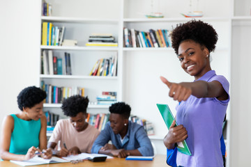 Successful african american female student at university