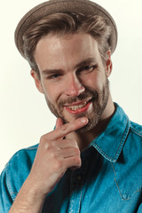 Smiling man posing in studio