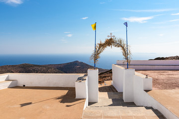 Exit the chapel of Agios Symeon with sea view. The top of the mountain on Sifnos island, Cyclades, Greece - obrazy, fototapety, plakaty
