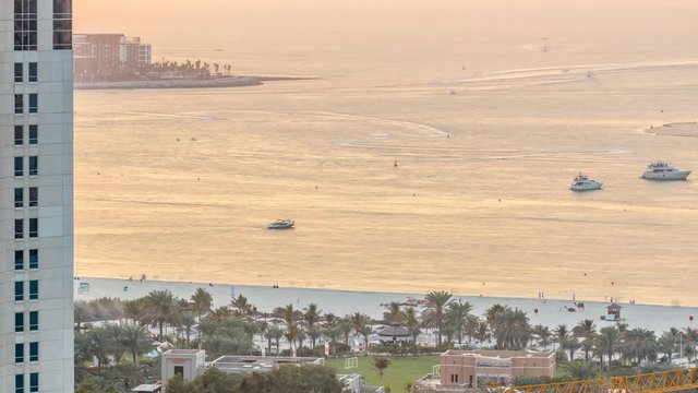 Sunset view of beach on JBR timelapse - Jumeirah Beach Residence in Dubai, United Arab Emirates