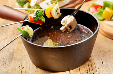Vegetarian fondue with cooking forks