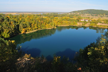 Wapnica, Poland, October 2018. The Turquoise lake also known as the Emerald Lake, it is classified as one of the most beautiful lakes of the Wolin National Park. 