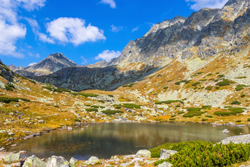 Hiking in High Tatras Mountains (Vysoke Tatry), Slovakia. Lake over Skok waterfall (Slovak: Pleso nad Skokom). Lies on 1801m directly above the Mlynicka dolina threshold above the Skok Waterfall © katatonia