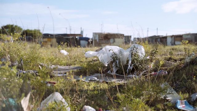 Plastic trash piling up outside an impoverished shanty town in South Africa.