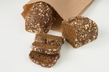 Isolate, handmade natural brown bread made from wholemeal flour on a white background