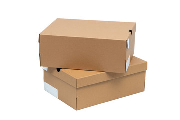 Brown cardboard shoes box with lid for shoe or sneaker product packaging mockup, isolated on white with clipping path.