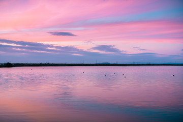 Sunset sky reflected in a lake, California