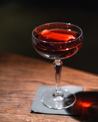 coupe glass of cocktail