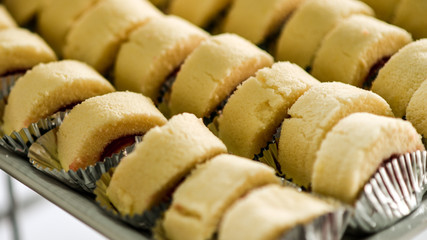 Jam roll bread placed in a container for dinner in a party