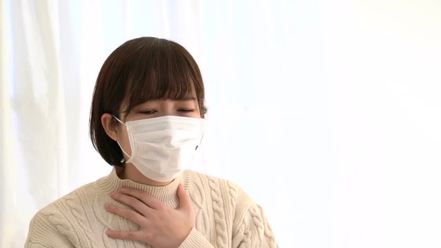 女性・咳・風邪・マスク