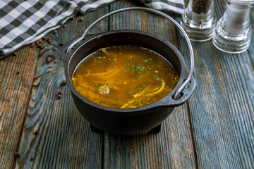 Chicken soup bouillon in a plate