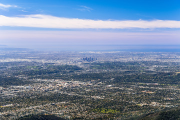 Panoramic aerial view of Los Angeles downtown and the metropolitan area surrounding it; Pasadena in...