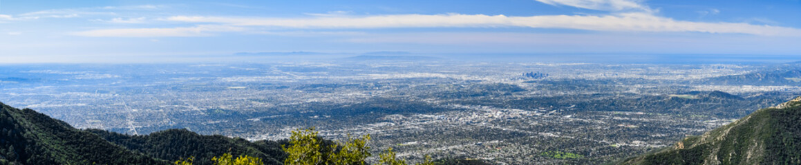 Panoramic aerial view of Los Angeles and the metropolitan area surrounding it; Pacific Ocean...