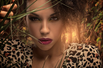 Afro girl in the jungle.