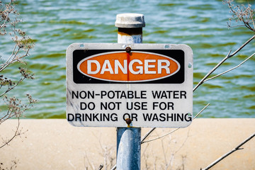 "Danger Non-potable water" sign posted on the shorelines of south San Francisco bay area, California