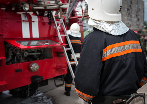  red fire truck with a ladder.