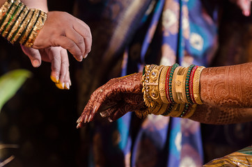 hands of bride with jewellery