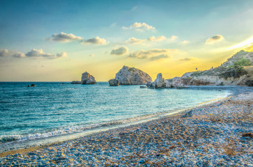 Sunset view over Petra tou Romiou alas Aphordite's rock on Cyprus