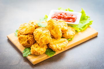 Deep fried chicken meat call nugget with tomato or ketchup sauce