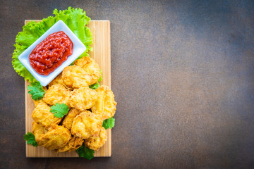 Deep fried chicken meat call nugget with tomato or ketchup sauce