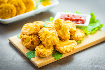 Deep fried chicken meat call nugget with tomato or ketchup sauce