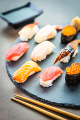 Nigiri sushi set with salmon tuna shrimp prawn eel shell and other sashimi