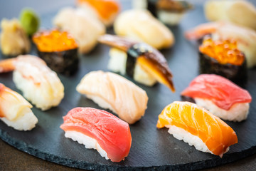 Nigiri sushi set with salmon tuna shrimp prawn eel shell and other sashimi