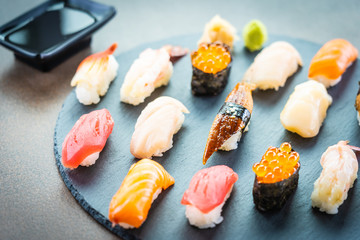 Nigiri sushi set with salmon tuna shrimp prawn eel shell and other sashimi