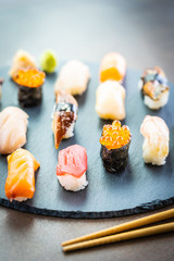 Nigiri sushi set with salmon tuna shrimp prawn eel shell and other sashimi