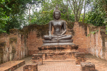 Buddha images are located outdoors. In the park in Ratchaburi province of Thailand