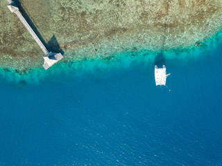 Aerial image from a drone of a small port at Bora Bora island, Tahiti, French Polynesia, South Pacific Ocean (Bora Bora Aerial).