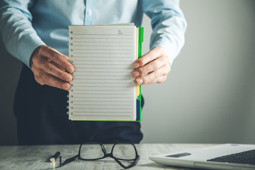 man hand notepad