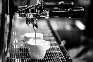 espresso shot from coffee machine in coffee shop,Coffee maker in coffee shop