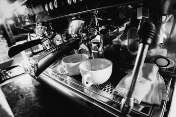 espresso shot from coffee machine in coffee shop,Coffee maker in coffee shop