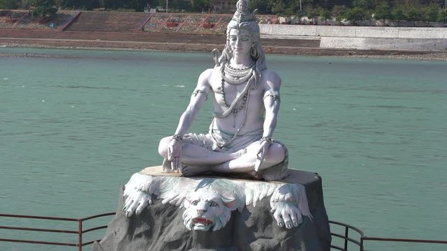 Statue Shiva, hindu idol on the river Ganges, Rishikesh, India