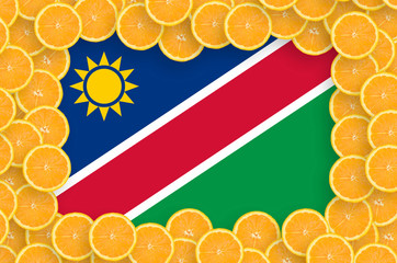 Namibia flag  in fresh citrus fruit slices frame