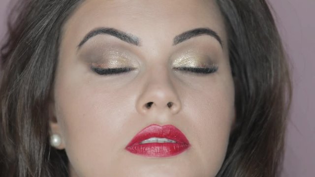 Movie star eyes. Close-up of an actor with light reflecting in their eyes.