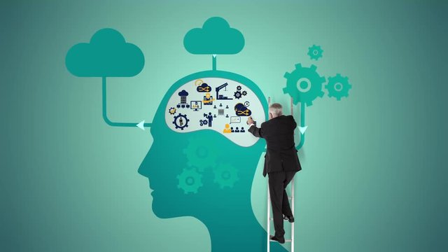 Man on ladder working on animated head 
