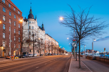 Obraz premium Helsinki, Finland. Night Traffic In Pohjoisranta Street In Night