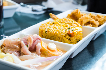 Peru food: triple, cebiche, seafood rice and chicharron of fish