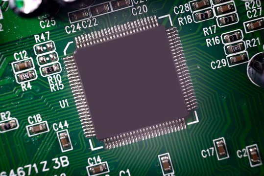 Close-up of Electronic chip in a computer circuit board.