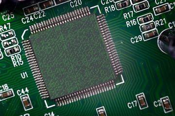 Close-up of Electronic Computer processor in a computer circuit board. Two photographers binary...
