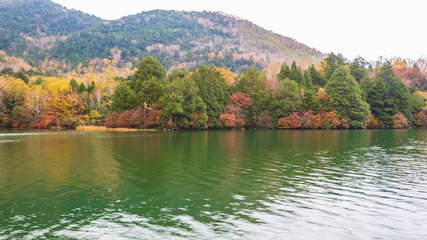 View of Yunoko lake in autumn season at Nikko national park, Nikko, Japan.