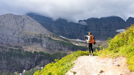 Girl hiking on a sunny day in Glacier National Park