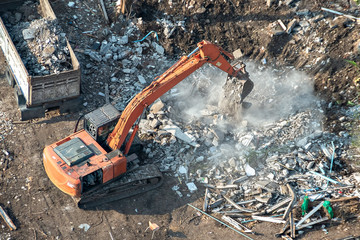 Aerial view of site preparation and construction in progress.
