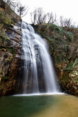 Fototapeta na wymiar Black waterfall and nature