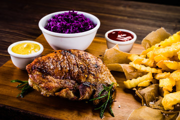 Grilled steak with french fries and vegetables