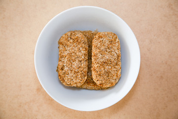 Rectangular wheat biscuits in a bowl